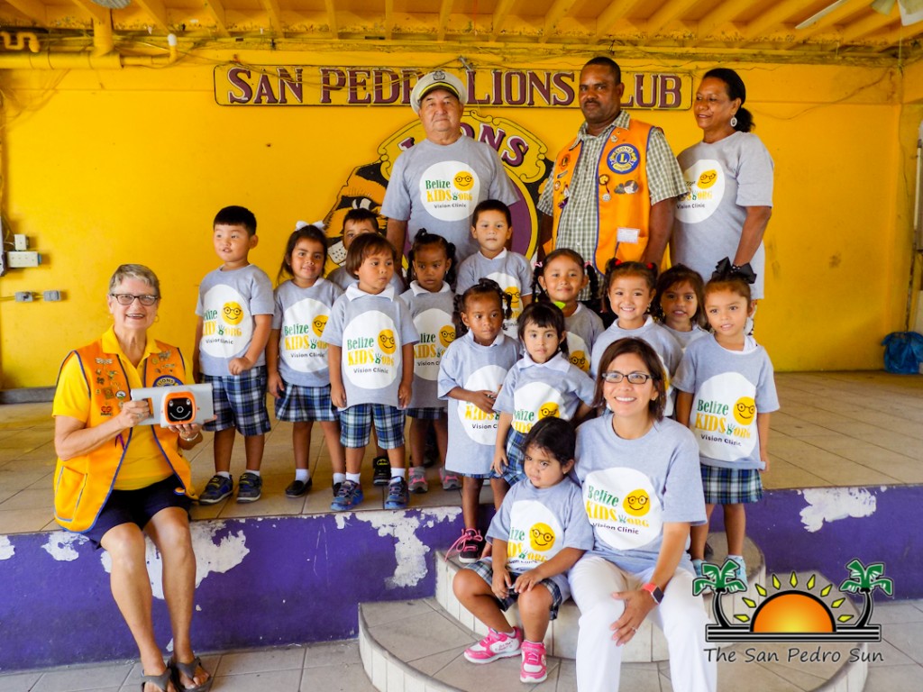Belize Kids Vision Clinic event with children and volunteers from San Pedro Lions Club